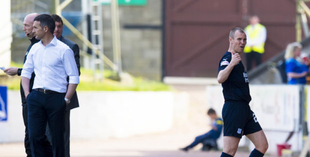 Kenny Miller shows his displeasure after being substituted.