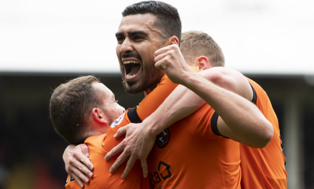 Rachid Bouhenna celebrates his goal.