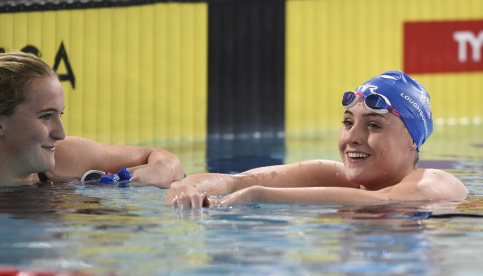 Abbie Wood looks on after Molly Renshaw (right) won Heat 7 of the Women's 200m Breaststroke.