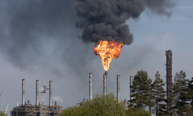 Thick plumes of black smoke belching from Mossmorran last year.