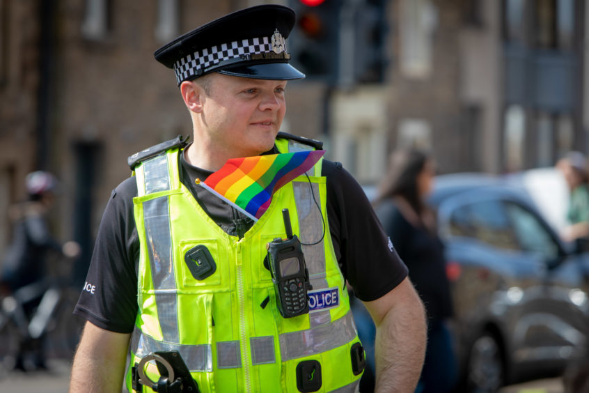 A St Andrews police officer also showed some solidarity with the crowd.