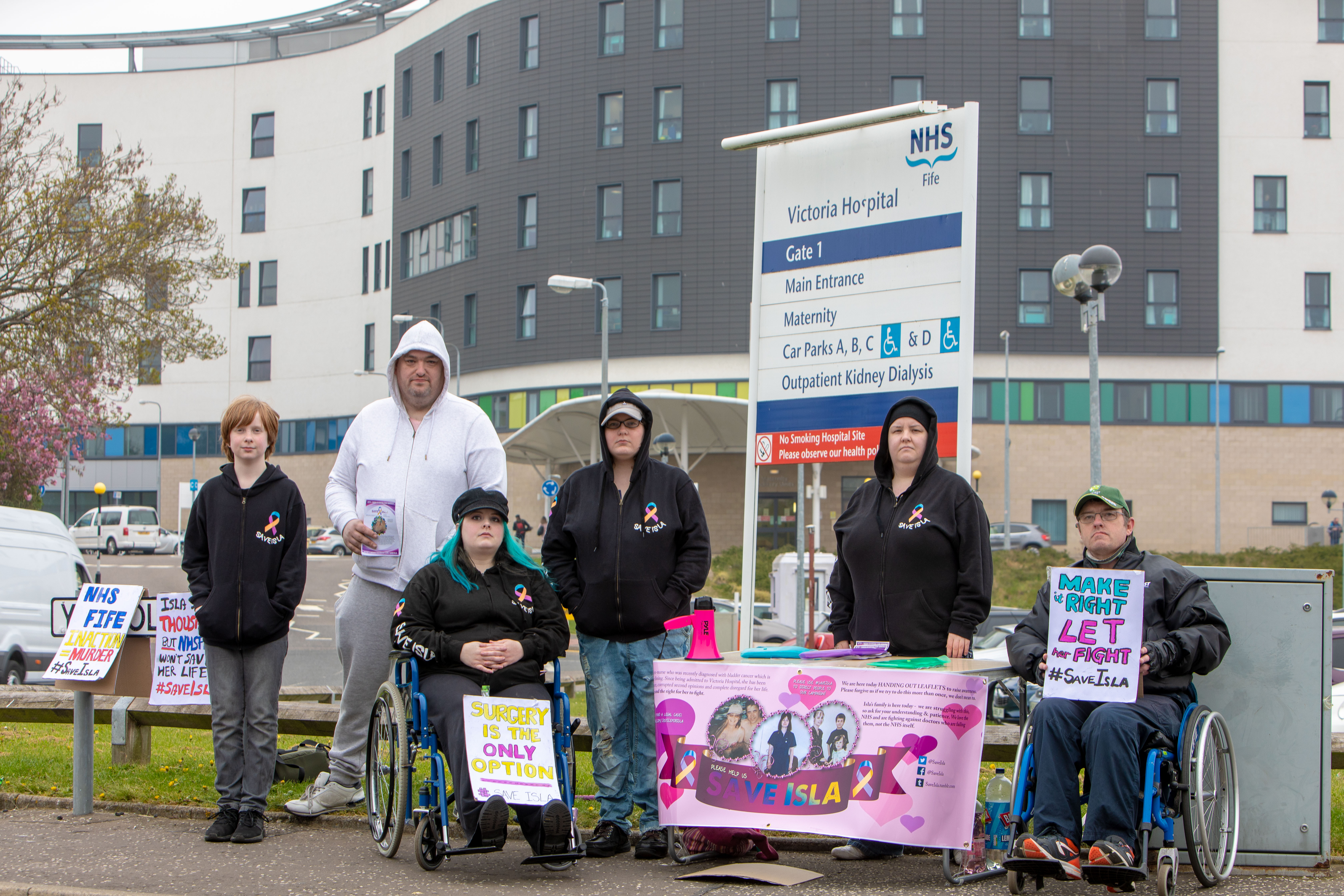 Family of Isabella Keatings protest against her discharge from Victoria Hospital. From left, Damien Keatings, 12, Thomas Trowell, 35, Kirstie Keatings, 30, Heather Bishop, 32, Lisha Keatings, 27, and Chris Macdonald, 47.