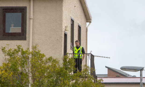 Police at the scene on Fod Street.