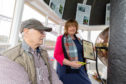 Garry Irvine from North Queensferry Heritage Trust in the 1817 Light Tower with MSP Fiona Hyslop