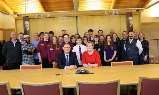 Councillor Caroline Shiers, Perth & Kinross Council's Lifelong Learning Convener with Bruce Renfrew, Trustee, Gannochy Trust youth workers and young people.