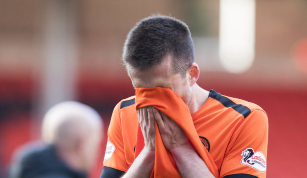 A dejected Callum Booth after his penalty miss.