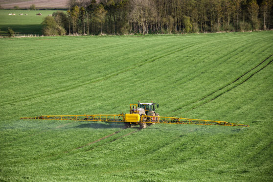 Farmers should consider sharing machinery to cut costs.