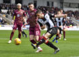 St Mirren's Mateo Muzek and Michael O'Halloran in action.