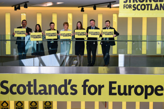 Nicola Sturgeon stands with her party's candidates for the forthcoming EU parliament elections.