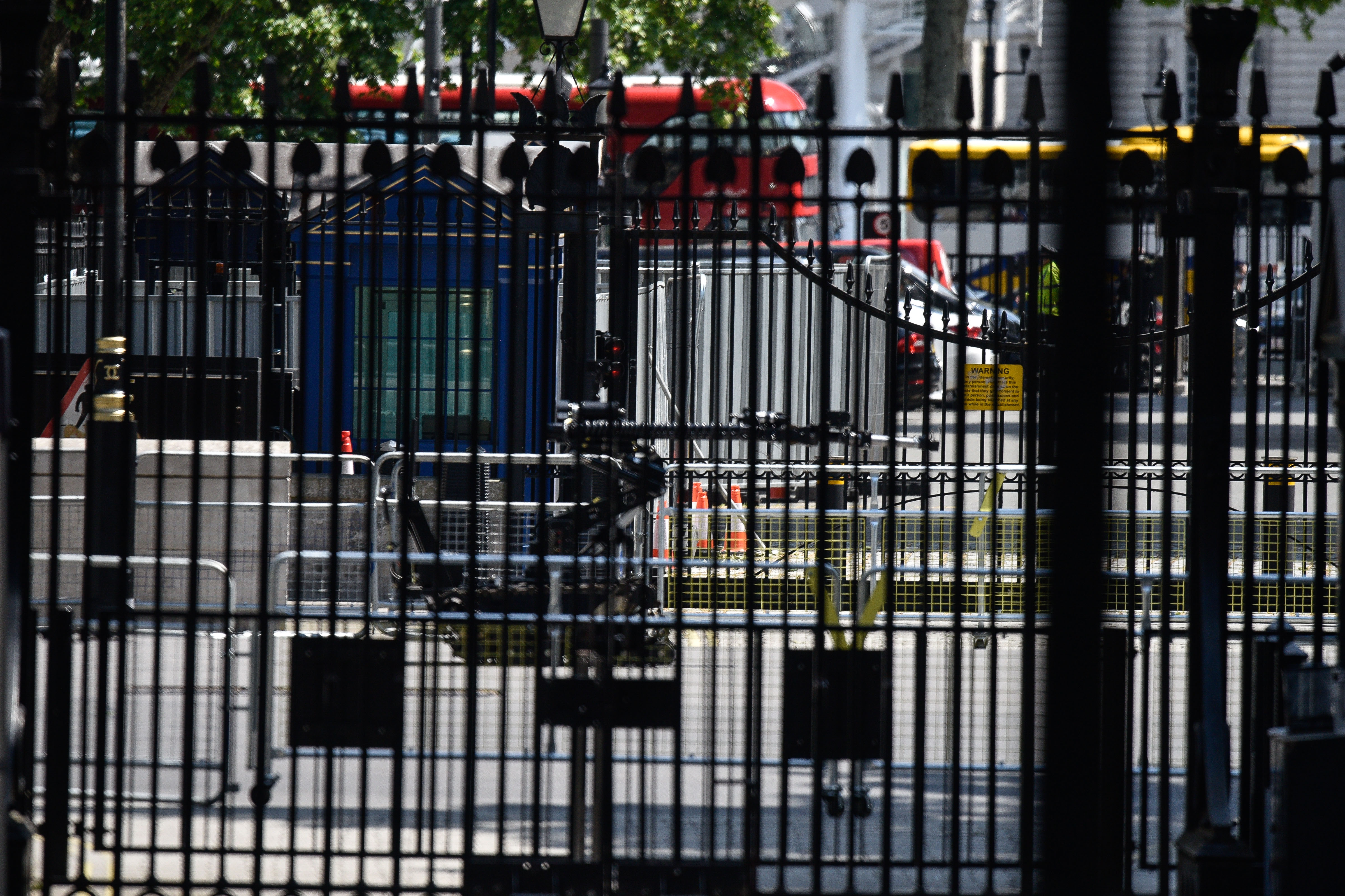 A bomb disposal robot drives past the gates to Downing Street on May 23, 2019 in London, England. Whitehall in Westminster was closed while police assessed a suspicious item.