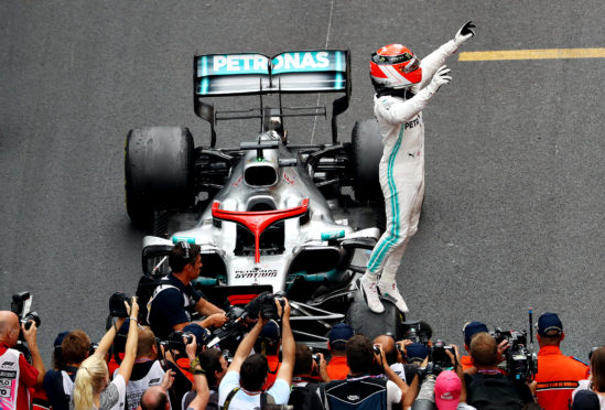 Race winner Lewis Hamilton of Great Britain and Mercedes GP celebrates in parc ferme during the F1 Grand Prix of Monaco at Circuit de Monaco.