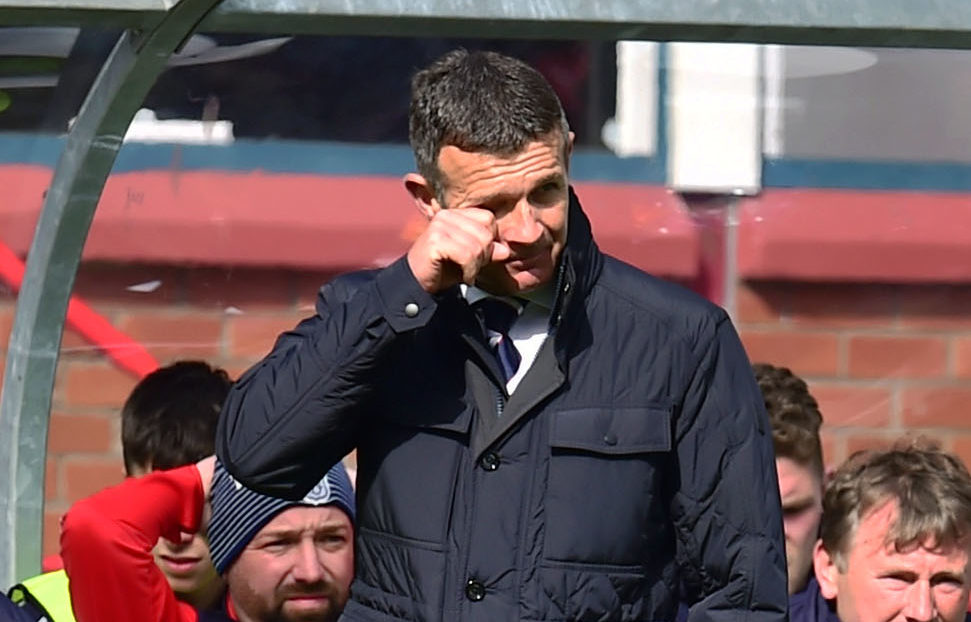 Jim McIntyre watches on as Dundee slump to defeat and relegation.