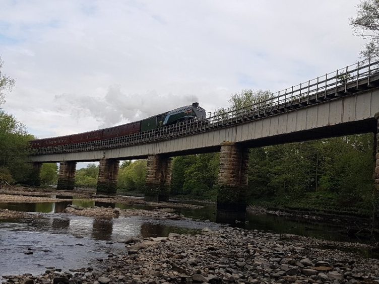 Paul Dimmock captured the train on camera, coming over one of Perth's railway bridges.