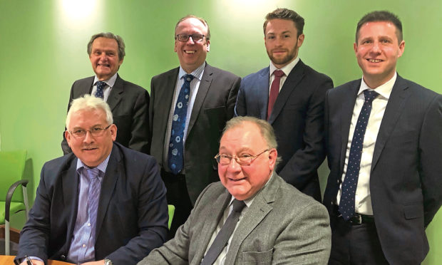 Back (left to right) Alistair Gibb, Ownership Associates; Dougie Rae, EQ; Neil McWilliam, Thorntons; and Chris Byrne, Thorntons. Front (left to right) GS Brown owners Des Brown and Mike Brown.