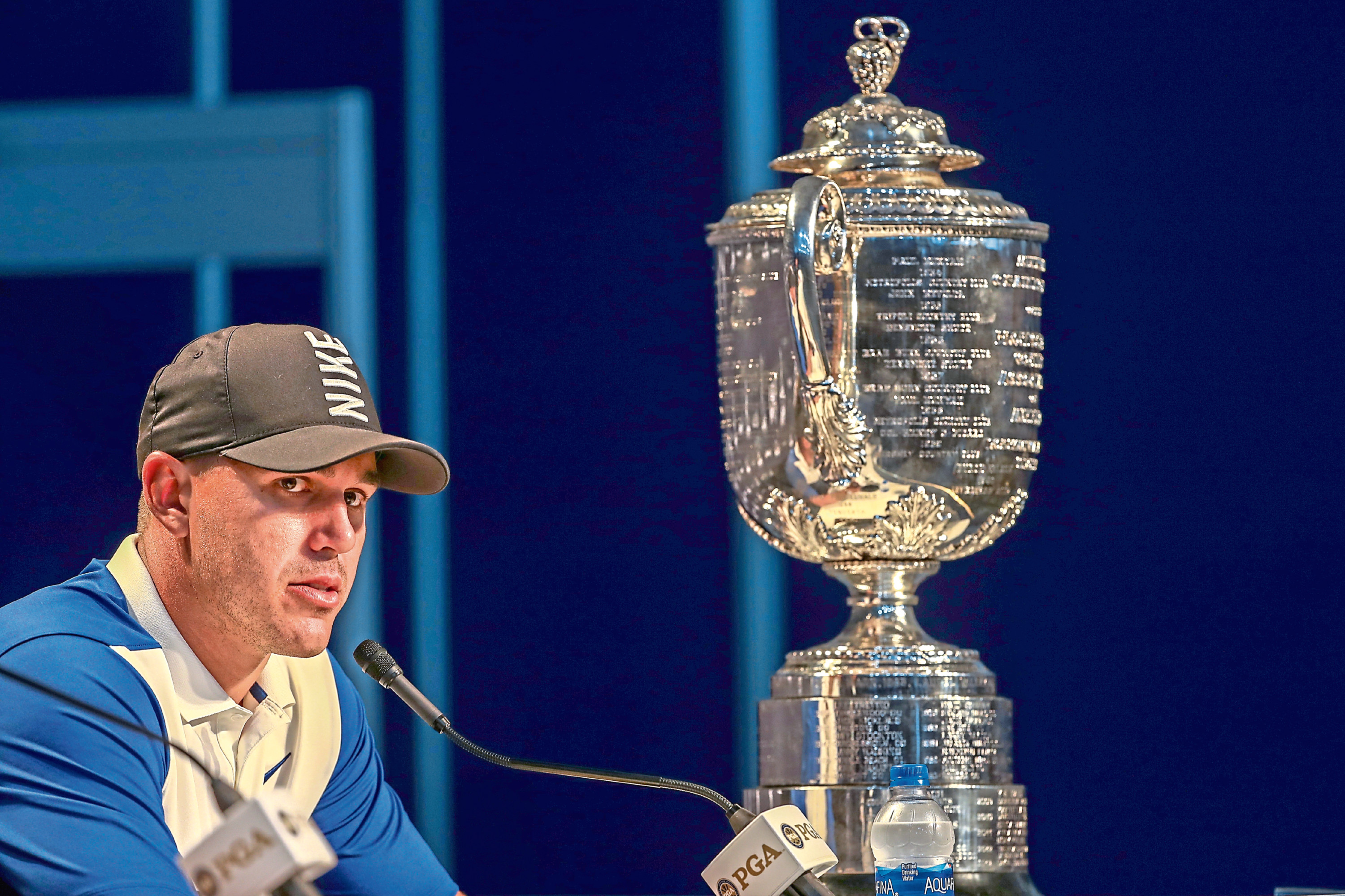 FARMINGDALE, NEW YORK - MAY 19: Brooks Koepka of the United States sits alongside the Wanamaker Trophy as he speaks to the media during a press conference after winning during the final round of the 2019 PGA Championship at the Bethpage Black course on May 19, 2019 in Farmingdale, New York. (Photo by Jamie Squire/Getty Images)