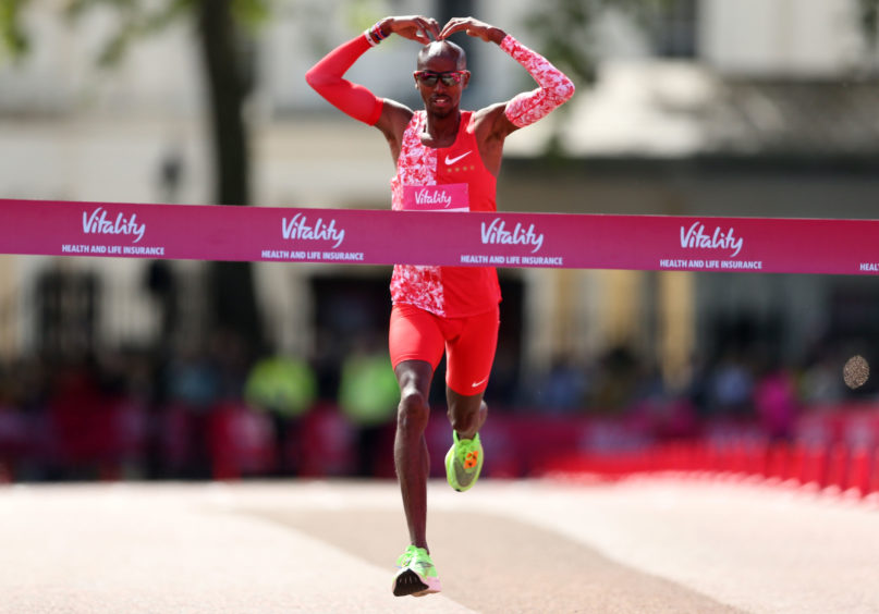 Sir Mo Farah wins the Men's Elite race during the Vitality London 10,000 in 2019 .