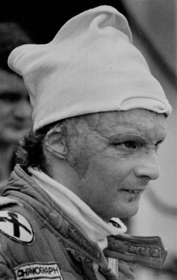 1977 file photo Austria's Niki Lauda, driving for Ferrari during a pit stop at the Grand Prix of Brazil.