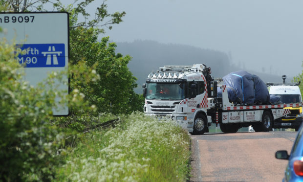 A recovery vehicle at the scene of the incident on the M90 near Kelty.