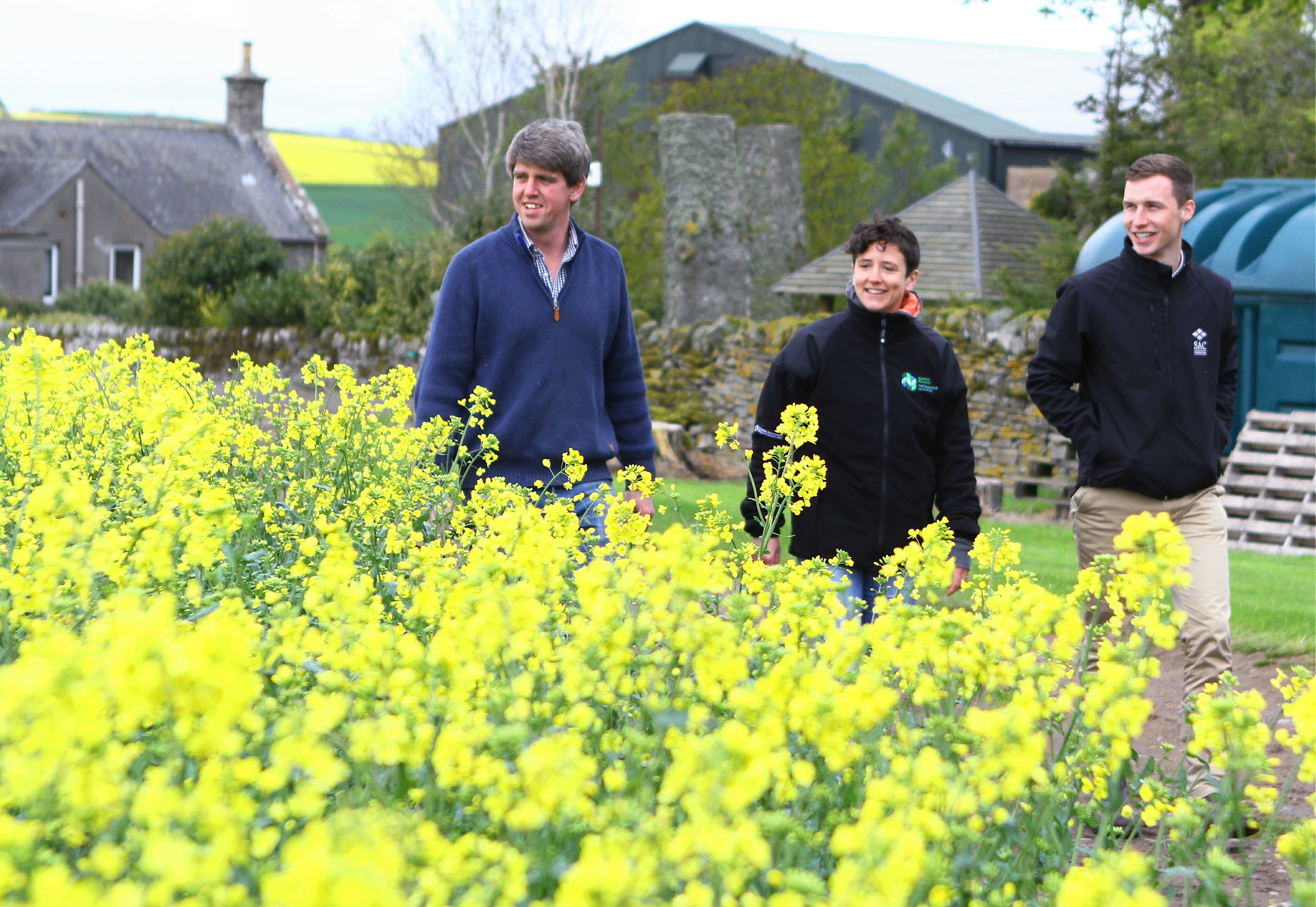 Hugh Black at his Backboath Farm, near Forfar, with rural affairs minister Mairi Gougeon and Zach Reilly, agricultural consultant with SAC Consulting.