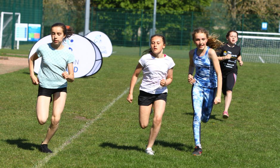 Pupils make a dash for the finish line.