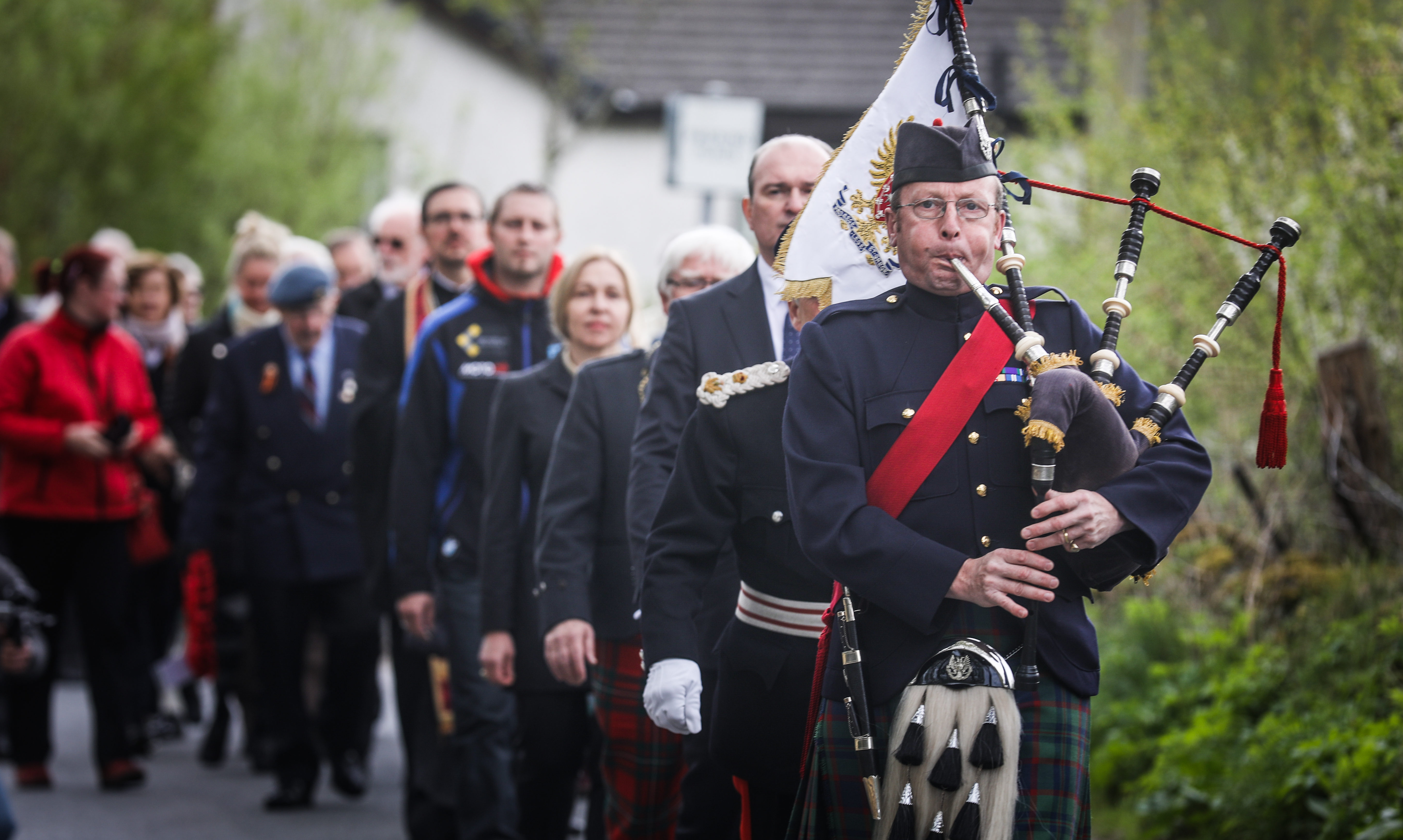 A ceremony for four Airmen (3 Russian, 1 Czech) who died in a plane crash during WW2 at Fearnan, Perthshire. The ceremony, which was filmed for Russian TV, began with a piper-led walk to the accident site.
All pictures by Mhairi Edwards.
