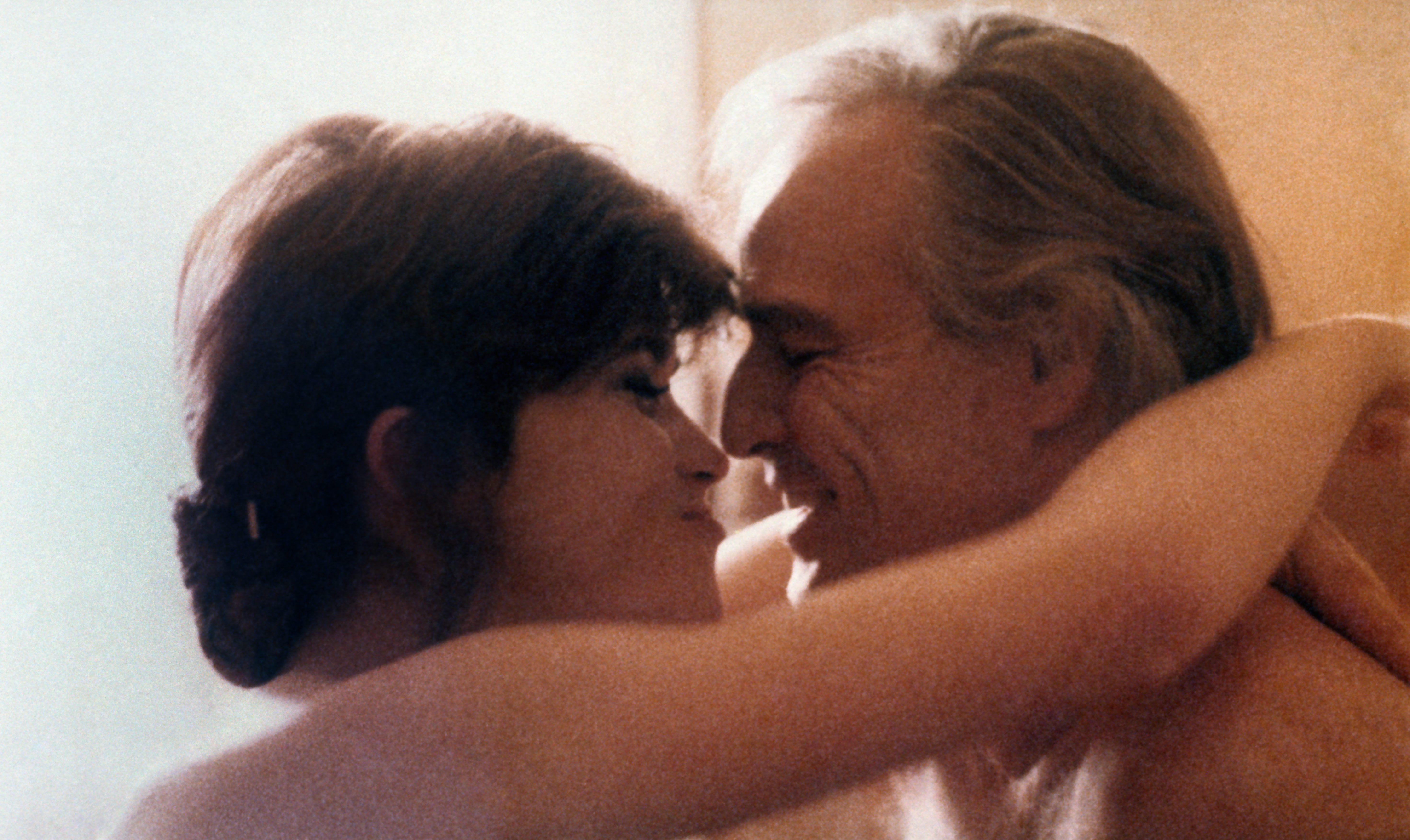 French actress Maria Schneider hugging American actor Marlon Brando in Last Tango in Paris.