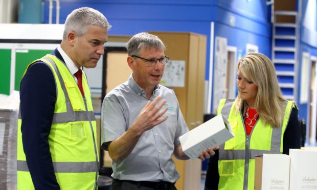 Brexit secretary Steve Barclay chatting to  Steve Larter and MP Kirstene Hair. Picture: Gareth Jennings