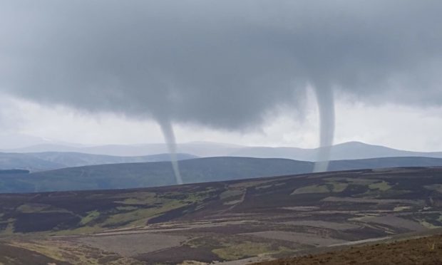 Dave Barrett captured the rare double tornado  in the hills north of Kirriemuir in May.