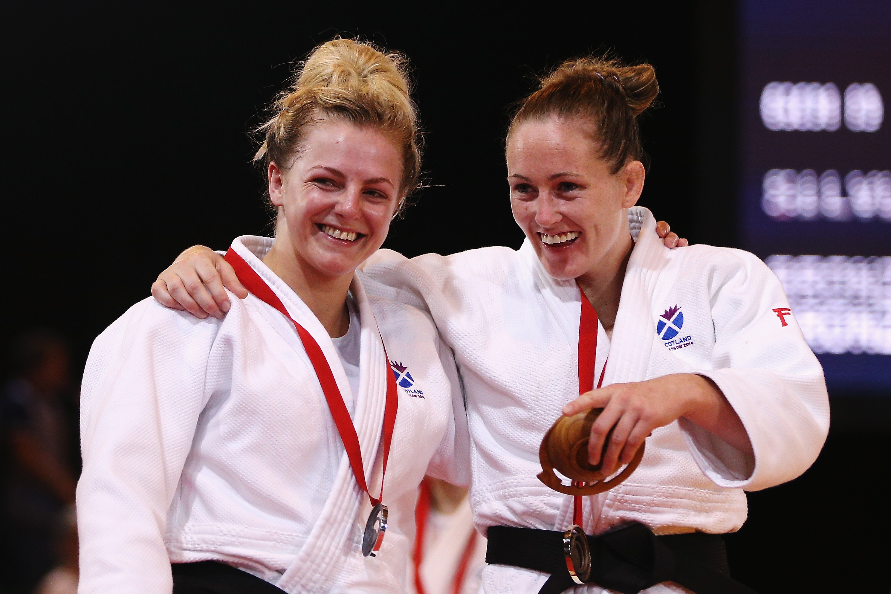 Stephanie Inglis and Connie Ramsay of Scotland pose with their medals on day one of the Glasgow 2014 Commonwealth Games.