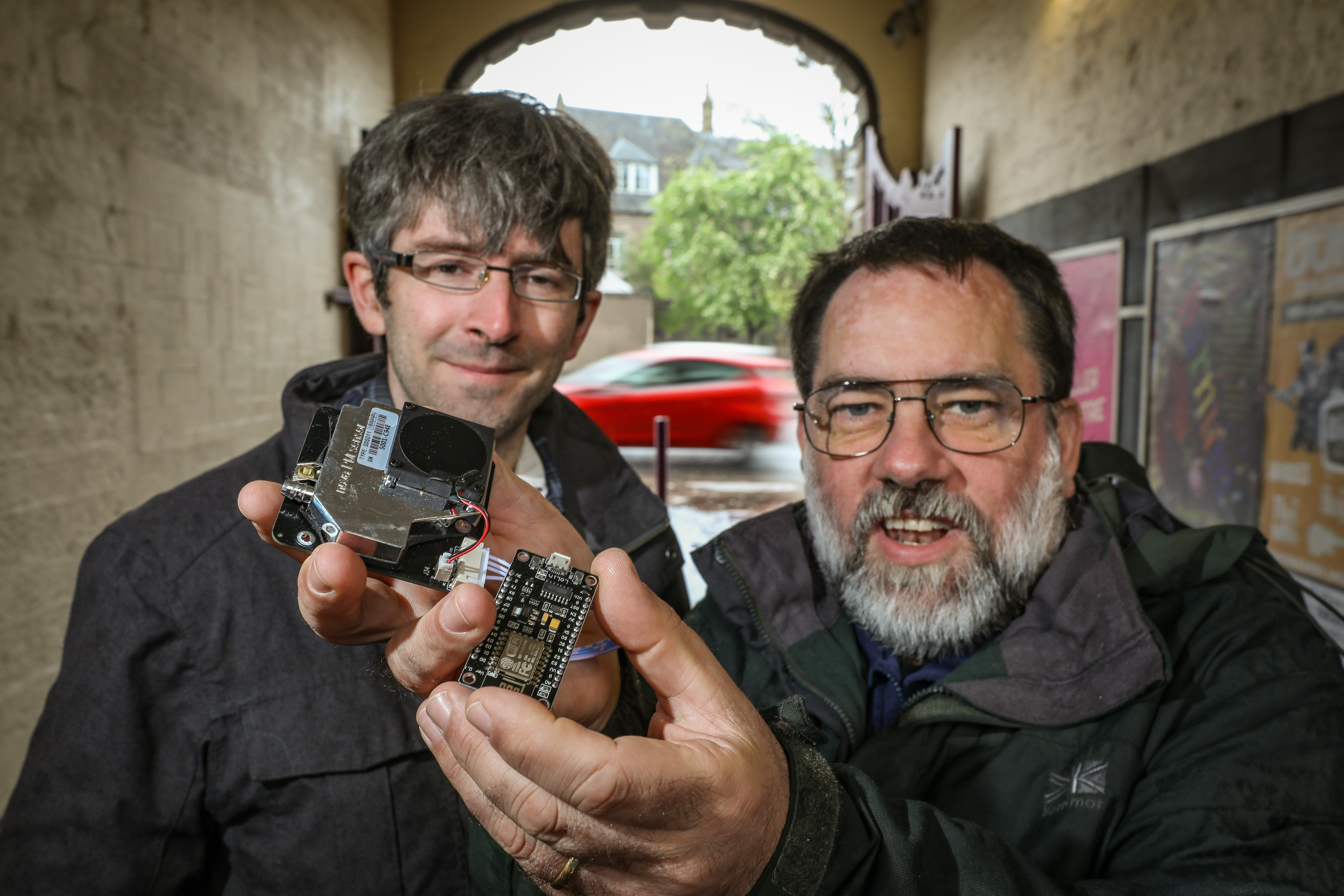 Dr Peter Cock, left, and Dr David Martin with a pollution sensor