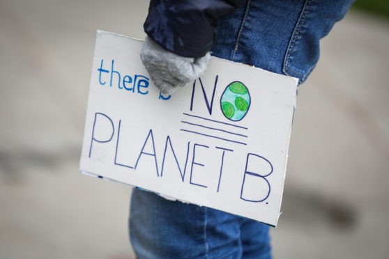 A Climate Change protest in the streets of St Andrews.