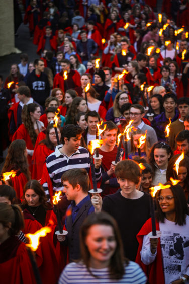 University of St Andrews students taking part in the Gaudie torchlight procession.