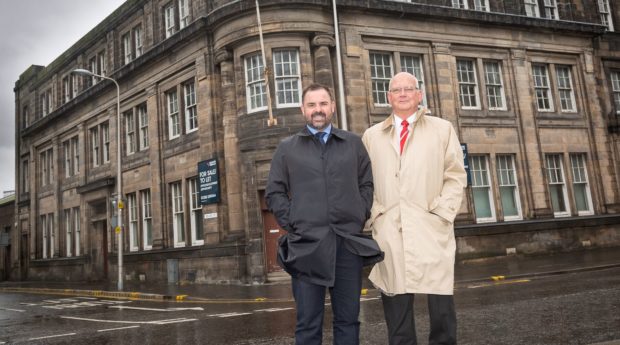 Graeme Carling and Syd Fudge outside the former JobCentre.