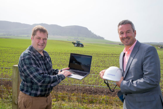 Classlochie farm resident Andrew Mitchell with Robert Thorburn, partnership director at Openreach.