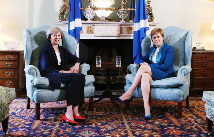 File photo dated 15/07/16 of Prime Minister Theresa May (left) meeting with Scotland's First Minister Nicola Sturgeon at Bute House in Edinburgh. The Prime Minister is expected to announce details later today of her timetable for leaving Downing Street.