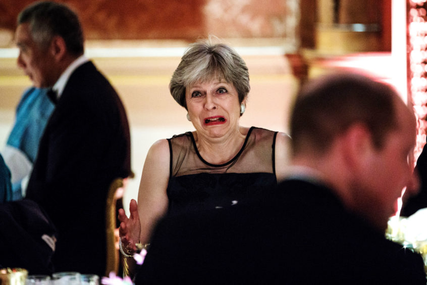 File photo dated 19/04/18 of Prime Minister Theresa May attending a dinner hosted by Queen Elizabeth II at Buckingham Palace in London during the Commonwealth Heads of Government Meeting. The Prime Minister is expected to announce details later today of her timetable for leaving Downing Street. PRESS ASSOCIATION Photo. Issue date: Friday May 24, 2019. See PA story POLITICS Brexit. Photo credit should read: Jack Taylor/PA Wire