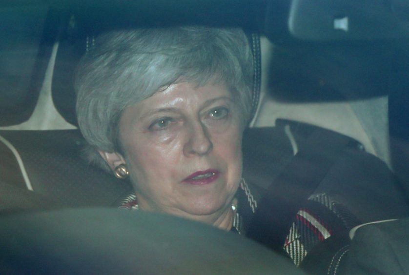 Prime Minister Theresa May leaves the House of Commons in London as Shadow Brexit secretary Sir Keir Starmer warned it was "impossible" to see how an agreement between the Conservatives and his party could clear the Commons unless it guaranteed the deal would be put back to the public for a "confirmatory vote".