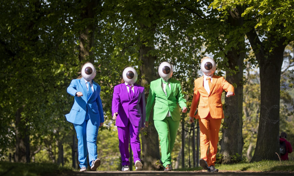 One-eyed characters from Creative Electric perform in Edinburgh's Inverleith Park for the opening of the 2019 Edinburgh International Children's Festival. The Edinburgh International Children's Festival takes place in various venues across the city from 25 May to 2 June 2019, and aims to promote, develop and celebrate theatre and dance for children and young people.