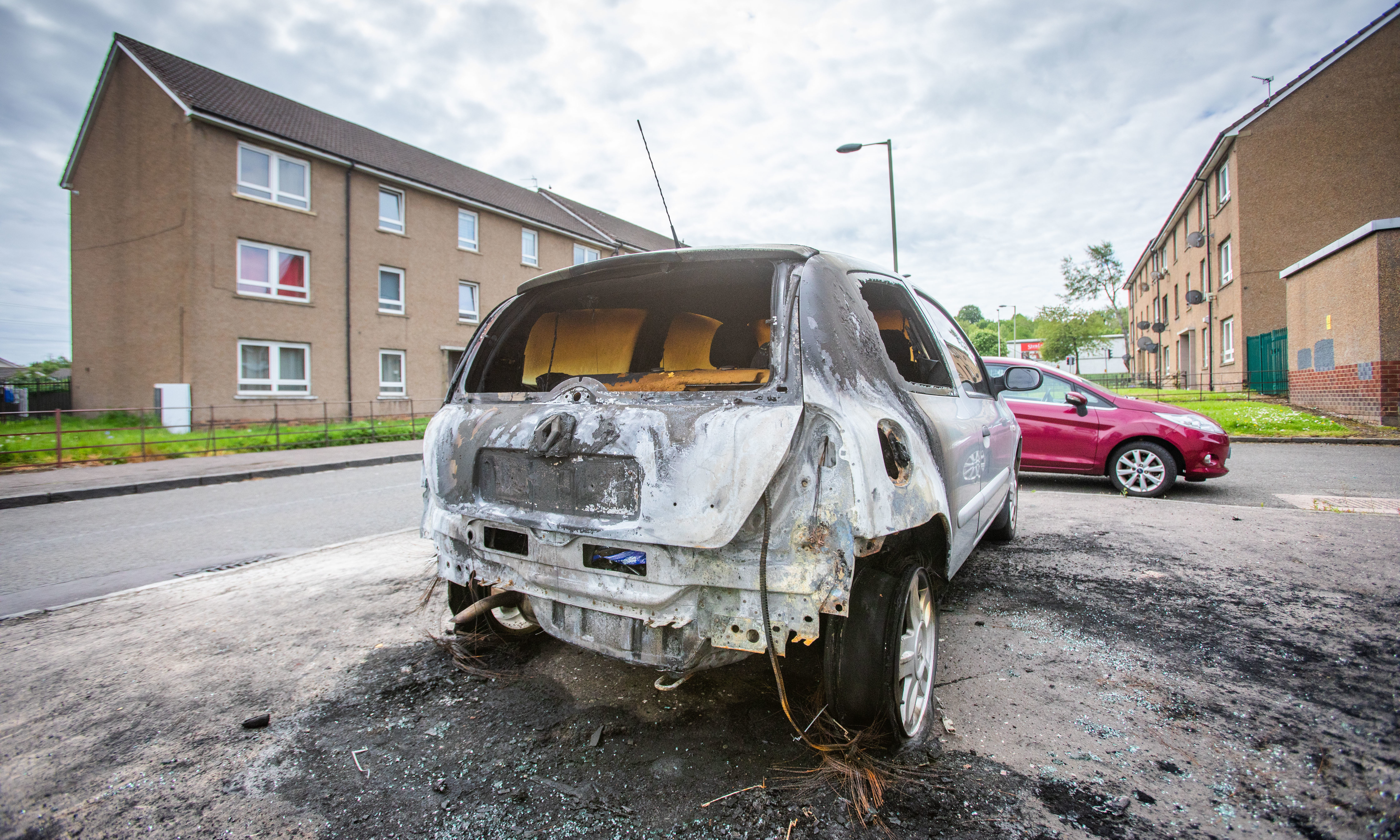 The burned-out car on Dunholm Road.