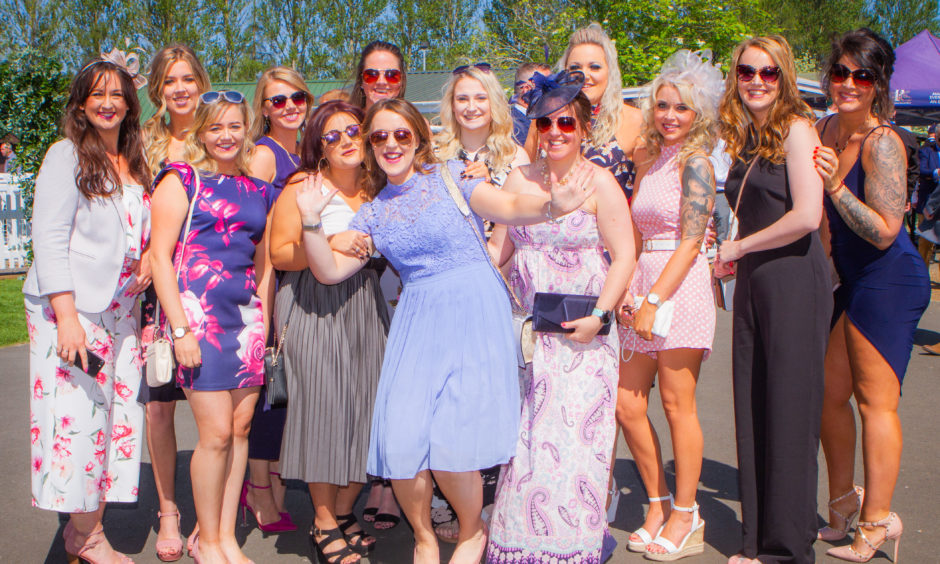 Jennifer Beveridge celebrates her 30th birthday at the races along with her family and friends.