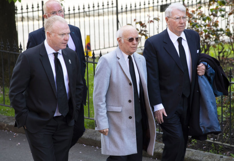 Scotland manager Alex McLeish (left) arrives at the funeral of Celtic's legendary European Cup winning captain Billy McNeill alongside former Rangers player Willie Henderson