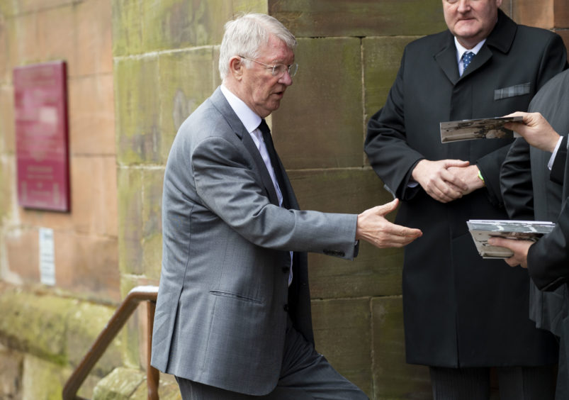 Former Manchester United manager Sir Alex Ferguson arrives at the funeral of Celtic's legendary European Cup winning captain Billy McNeill