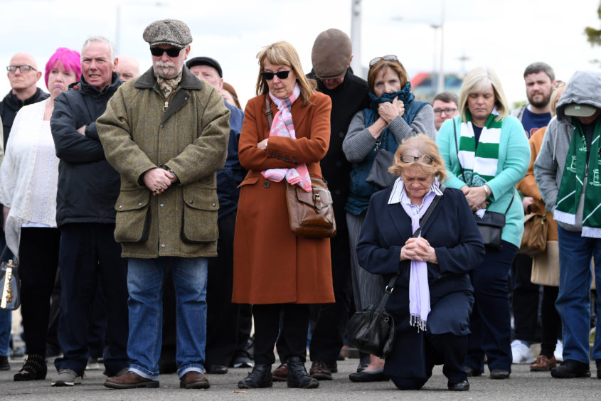 03/05/19
CELTIC PARK - GLASGOW
Mourners gather at Celtic Park to pay respects to their legendary European Cup winning captain Billy McNeill as his funeral takes place in Glasgow