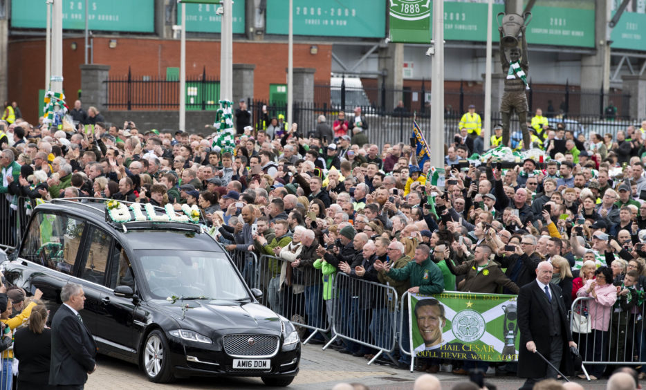 The hearse of legendary Celtic captain Billy McNeill makes its way past Celtic Park, and the Billy McNeill statue, following his funeral