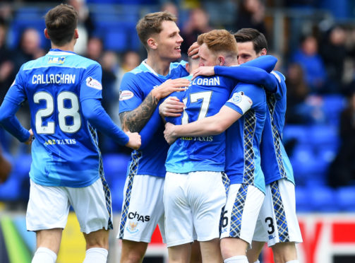 Michael O'Halloran and teammates celebrate his goal.