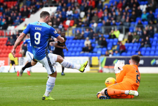 St Johnstone striker Chris Kane is denied a goal.