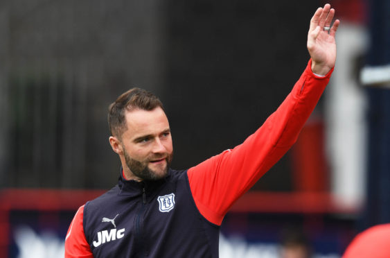 James McPake waves to the fans.