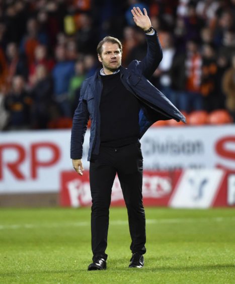 United manager salutes the home fans.