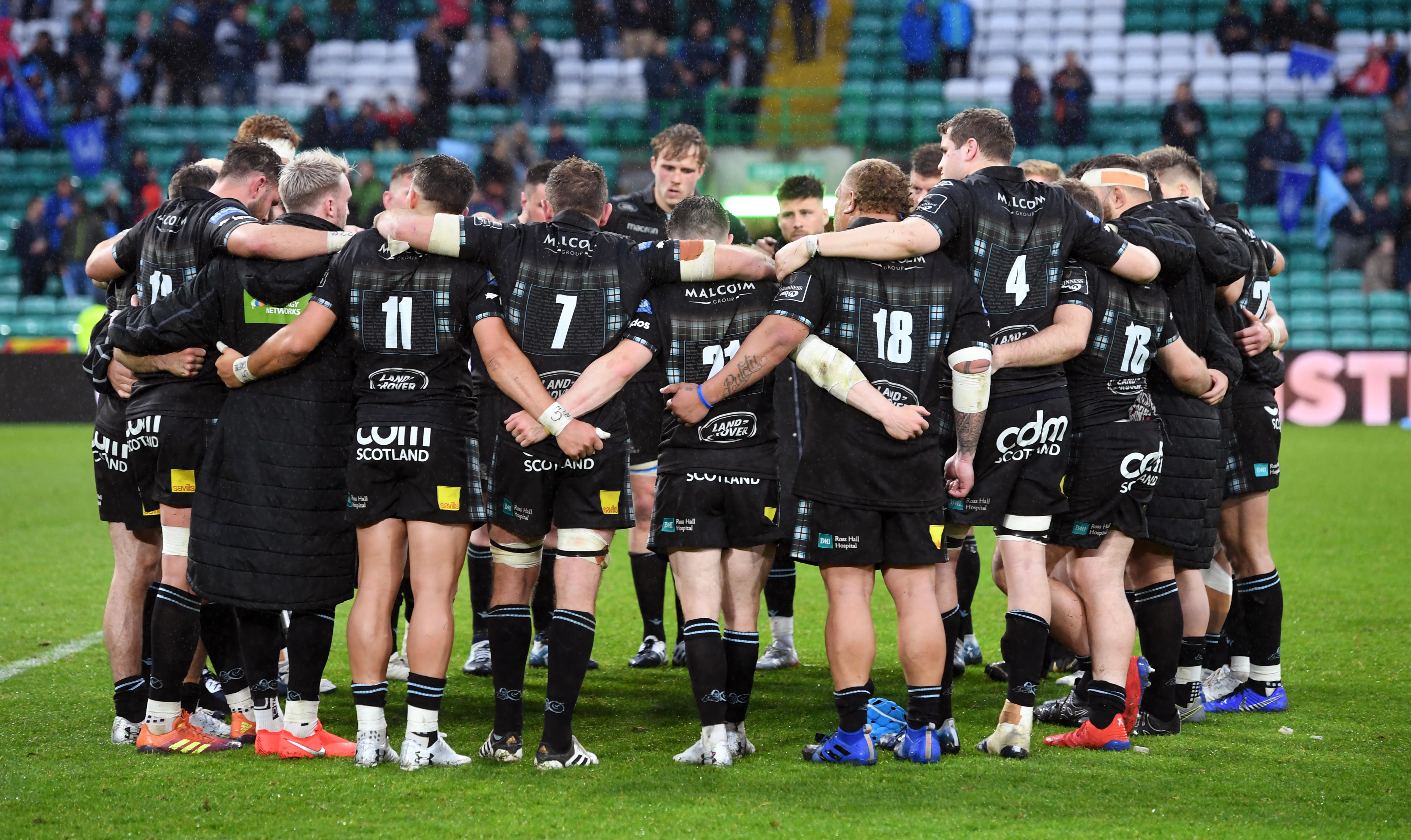 The Warriors players huddle at the end of the PRO 14 final.