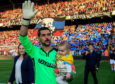Crystal Palace goalkeeper Julian Speroni walks out for his testimonial match against Dundee at Selhurst Park.